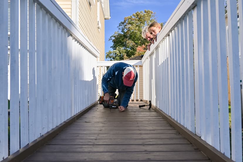 a volunteer working on a walkway